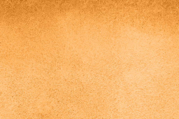 istock Concrete orange colorful wall surface texture. Abstract grunge bright marigold color background with aging effect. Copyspace. Trendy color of the year 2021. 1354179210