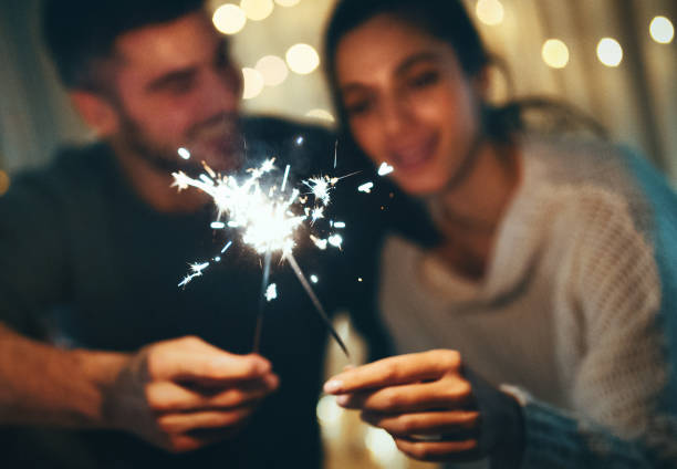 istock Young couple spending Christmas eve at home. 1354180534