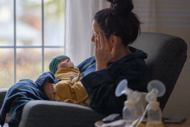 Mother Experiencing Postpartum stock photo