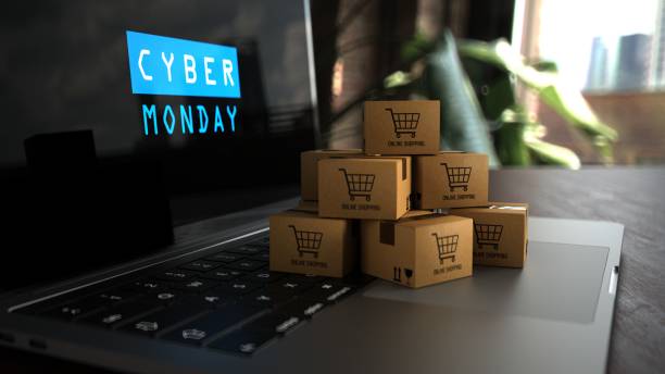 notebook paczki zakupy online cyber poniedziałek - cyber monday zdjęcia i obrazy z banku zdjęć