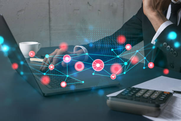 istock Businessman search for tech solutions options, typing laptop background and abstract technology hologram. 1354188228