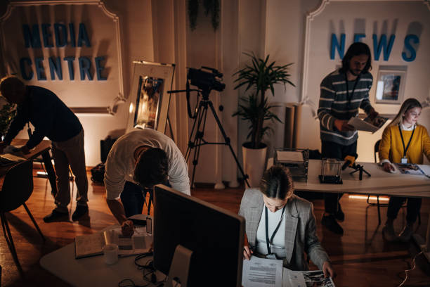 istock Busy night in news editorial office 1354189462