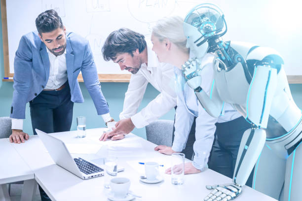 istock Businessmen with humanoid robot working 1354189548