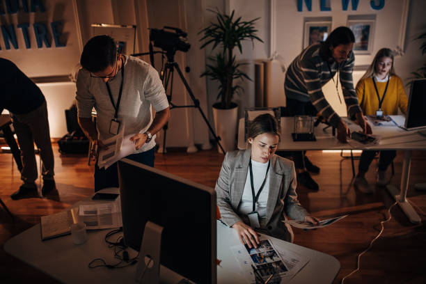 istock Busy night in news editorial office 1354189554