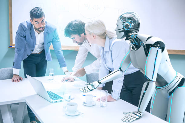 istock Businessmen with humanoid robot working 1354189564