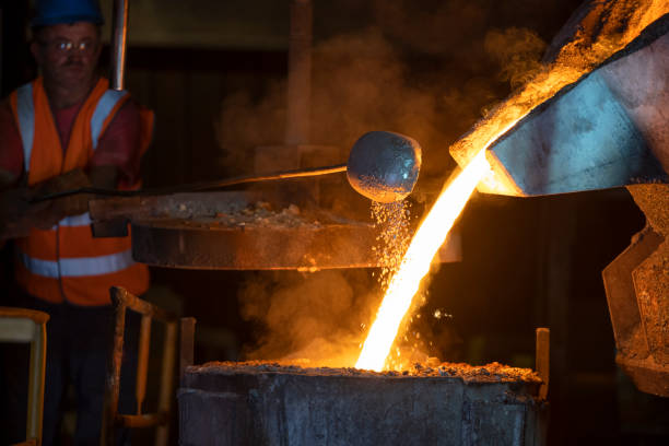 istock Mature man working in steel mill 1354189716