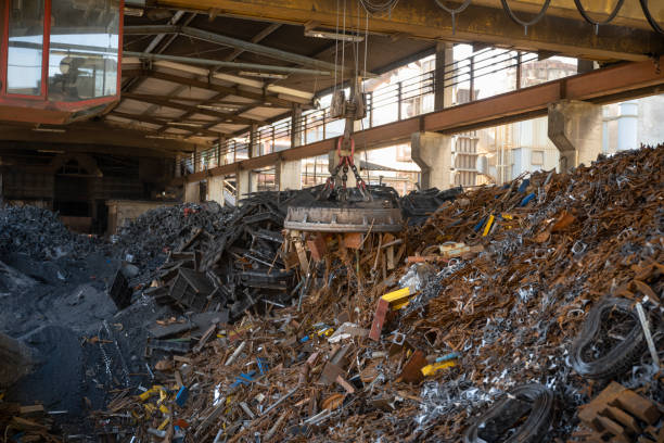istock Scrap magnet carrying scrap metal 1354189730
