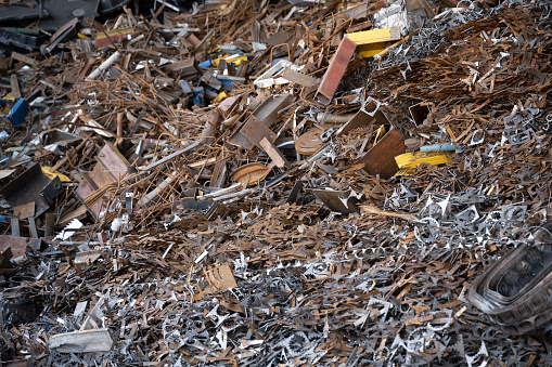 View of large pile of used metal pieces in the recycling facility.