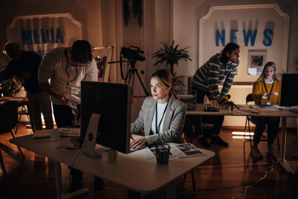 istock Busy night in news editorial office 1354190000