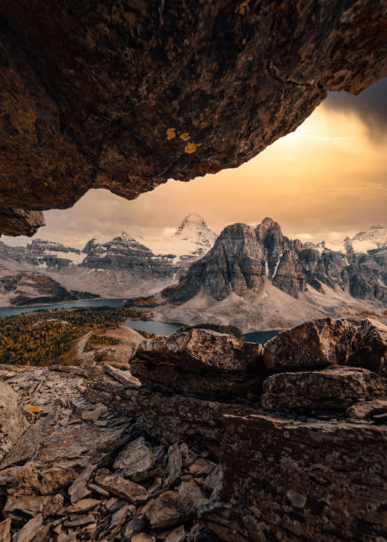 Mount assiniboine and stone cave on Nublet peak at the sunset