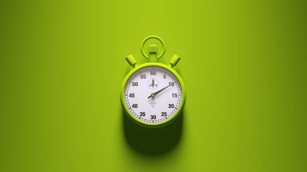 green stopwatch time clock alarm watch white face timer green background - stopwatch imagens e fotografias de stock