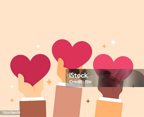 istock Hands Holding Hearts 1354196419
