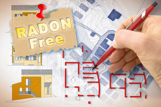 istock Safe from dangerous radon gas in construction industry and building - activity - concept with architect drawing with construction material for a residential building free from radon 1354196759