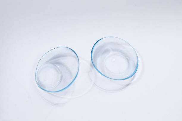 istock contact lenses on blue background close up view 1354197826