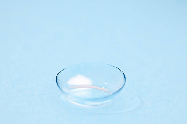 istock contact lenses on blue background close up view 1354197988