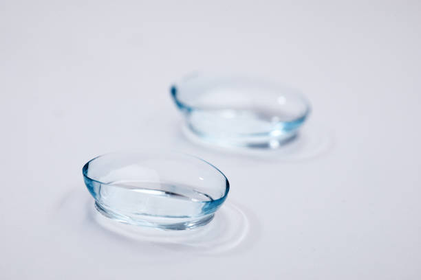 istock contact lenses with droplets around close up view 1354198561