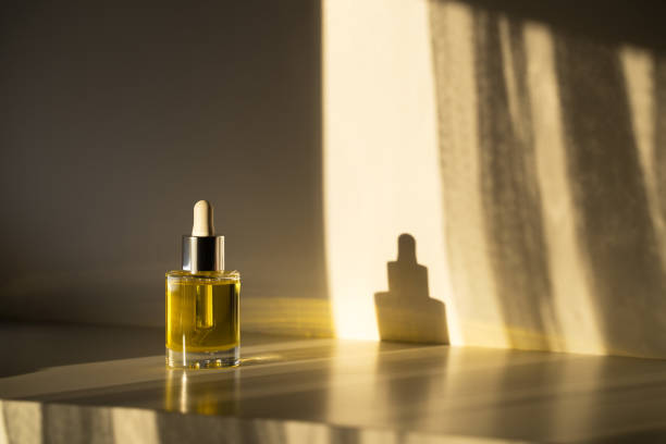 istock face oil on white background with shadows 1354199037