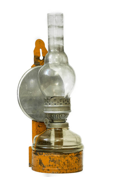 istock Vintage brass oil lamp on a white background 1354201405