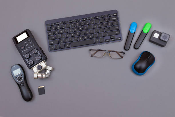 istock Digital Gadgets on Grey Table - Video Blogger's Workplace 1354202601