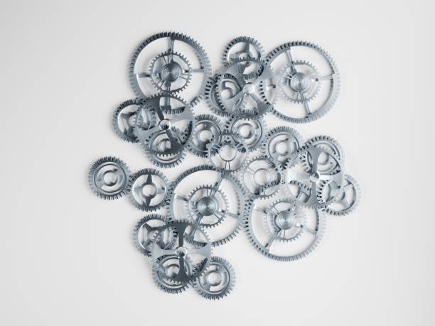 istock Precision engineering, concept background. Shiny steel gears on light surface. Digital 3D rendering. 1354202745