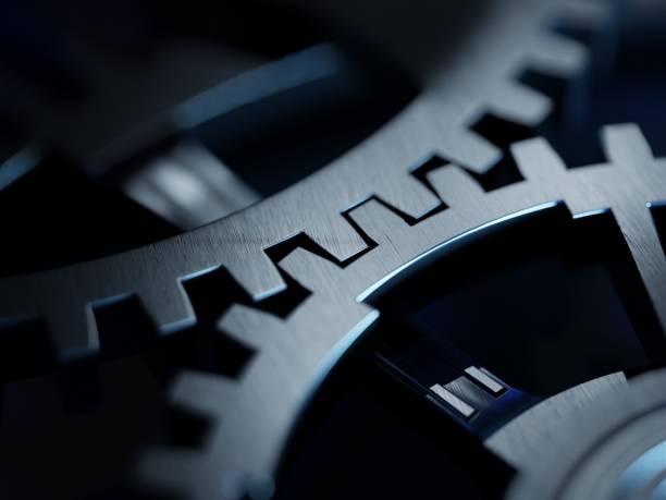 istock Steel gears from an engine gearbox, close up. High performance engines, concept. Digital 3D rendering. 1354202770