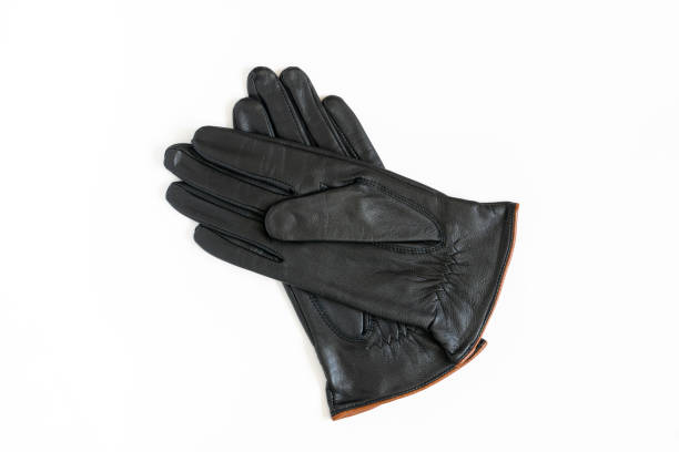 Open hand with black leather glove. Isolated on white.See also: