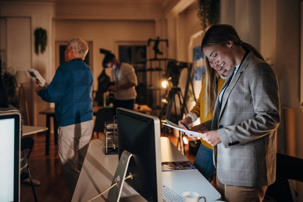 istock Working late in news editorial office 1354203887