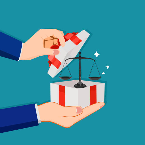 istock A businessman opens a gift box with a scale. concept of justice 1354206531