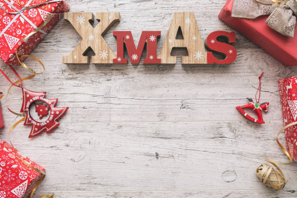 istock Christmas Gift Boxes on Wooden Table 1354206565