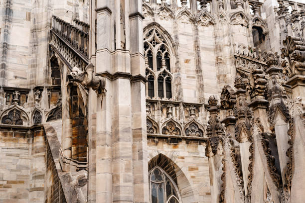istock Duomo marble facade with arched windows. Italy, Milan 1354208181