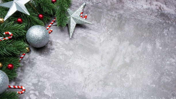 istock Christmas decorations, pine tree leaves, balls, berries on grunge background, Selective focus christmas concept 1354209428
