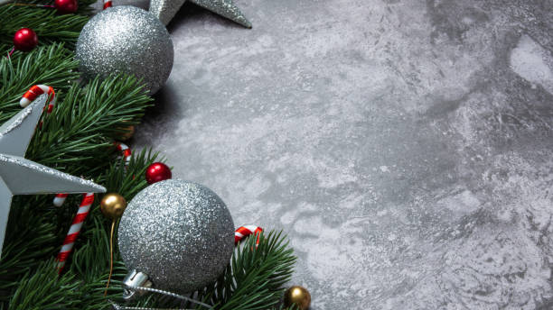 istock Christmas decorations, pine tree leaves, balls, berries on grunge background, Selective focus christmas concept 1354209501
