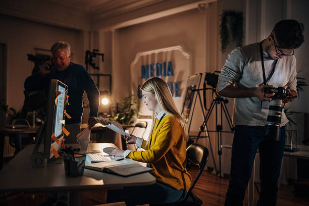 istock News team working late 1354210602