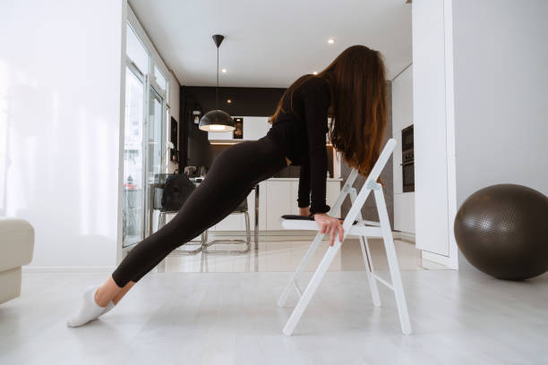istock Young attractive smiling woman practicing yoga 1354210801