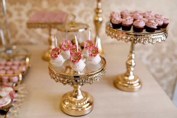 istock pink candies and cupcakes at a candy bar 1354211242