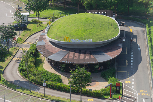 Singapore, Singapore - November 16, 2021: A McDonald's restaurant at Jurong Central Park, unique for having a green grass-covered roof.