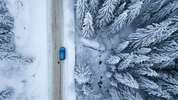 istock Winter driving in snowed mountains 1354212314