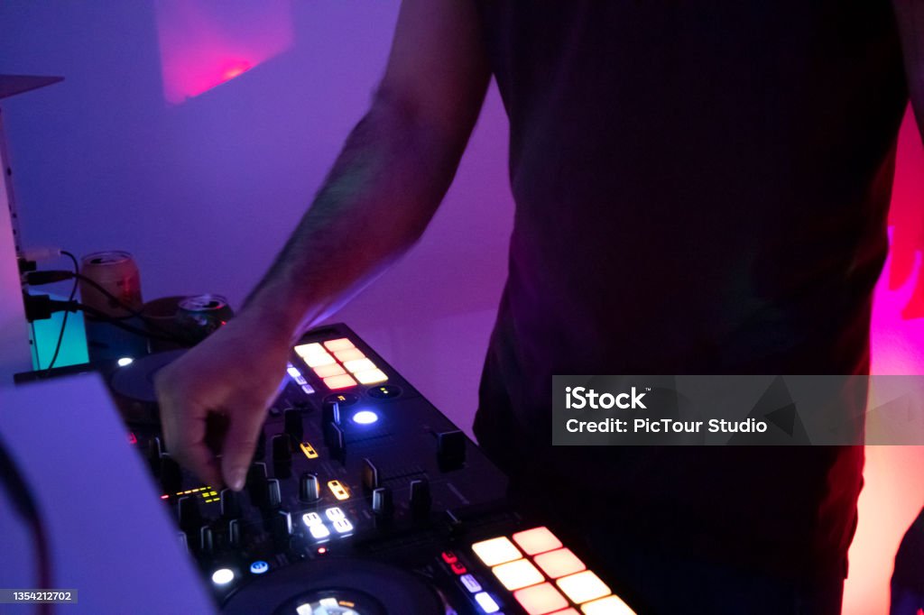 DJ-ing and Partying At Home Dj, Night, Home interior, Party - social event, Playing Men Stock Photo