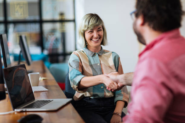 istock Shaking hand means that a deal has been made 1354213406