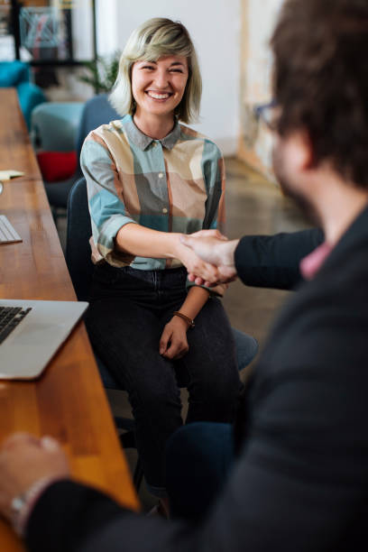 istock Shaking hand means that a deal has been made 1354213408