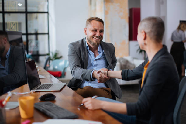 istock Shaking hand means that a deal has been made 1354213411