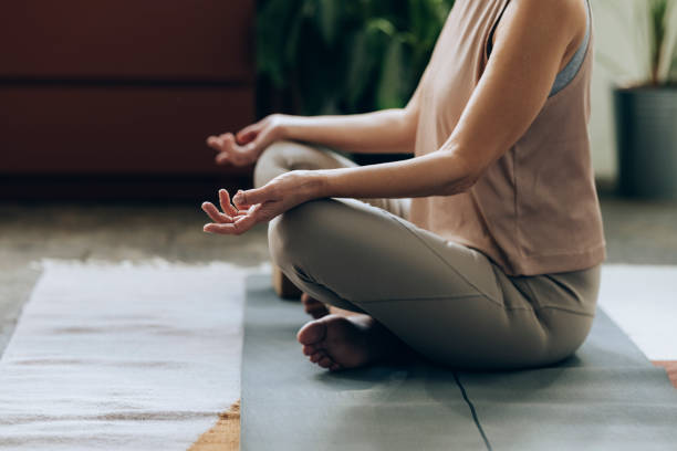 istock An Anonymous Senior Woman Meditating at Home 1354213598