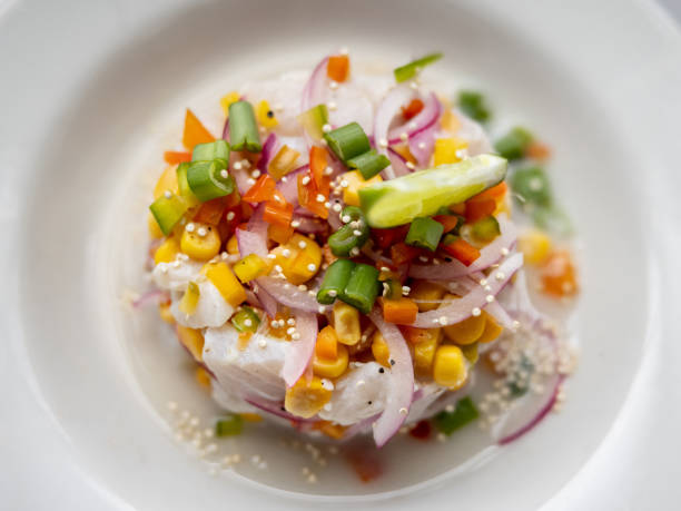 istock Close-up on a plate of ceviche served at a restaurant 1354214287
