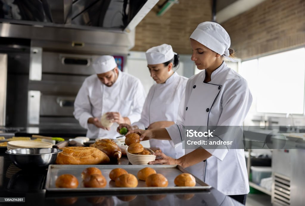 Bakery Making Bakers Working At The Bakery Making Bread Stock Photo - Download Image ...