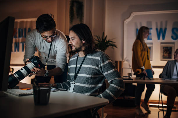 istock Men working in news editorial office 1354214949