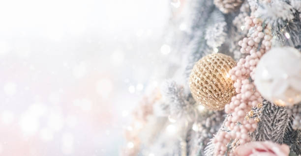 istock Decorated Christmas tree with lighten bokeh background. 1354217757