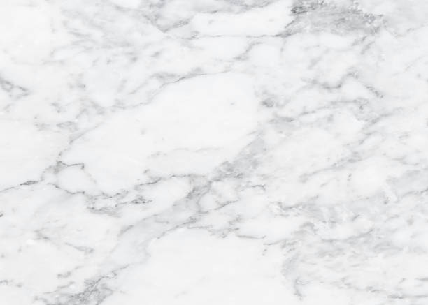 istock White marble texture background pattern top view. Tiles natural stone floor with high resolution. Luxury abstract patterns. Marbling design for banner, wallpaper, packaging design template 1354219584