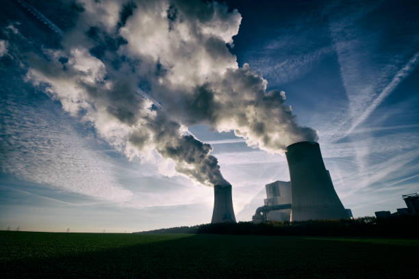istock Pollution spilling into the sky from a coal fired power plant 1354219977