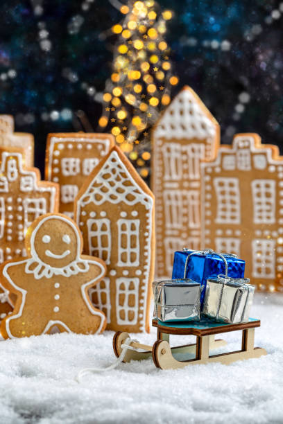 istock Christmas card with a festive gingerbread town. 1354225746