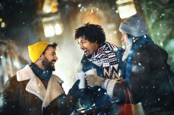 istock Friends taking a break during Christmas eve shopping. 1354225804